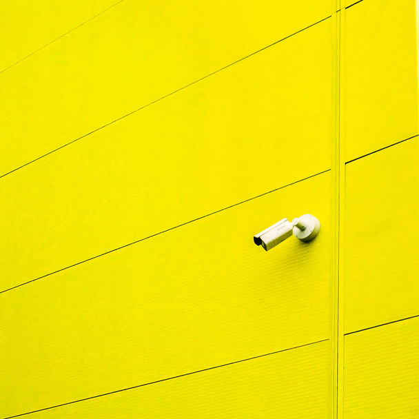 Yellow Wall with Security Camera - Valokuva, kuva