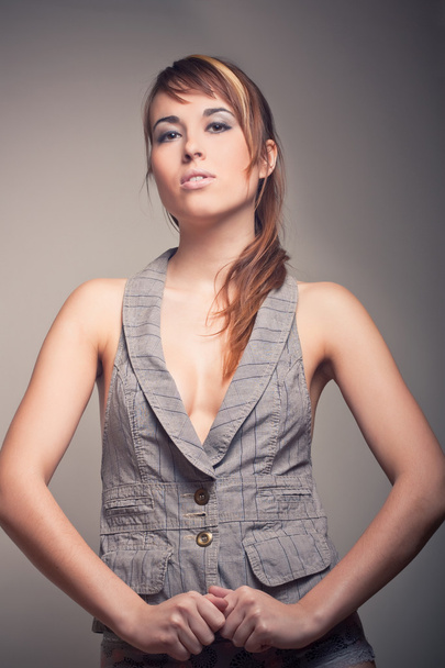Attractive brunette girl in vest - Photo, image