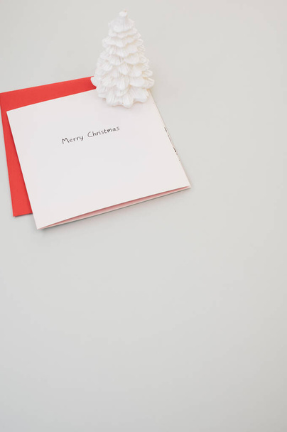 A closeup shot of Christmas wishing cards on the table - Фото, зображення
