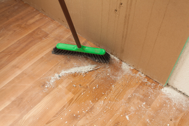 Cleaning debris on floor by brush - Photo, Image