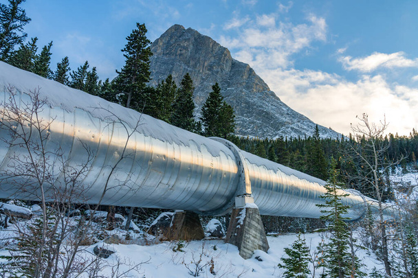 Big pipeline in Grassi Lakes hiking trail connects Whitemans Pond and Rundle Forebay. Hydro power system in Canmore, Alberta, Canada. - Photo, Image