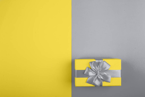 New Years gift in Trendy colors 2021 - Gray and Yellow. - Foto, imagen