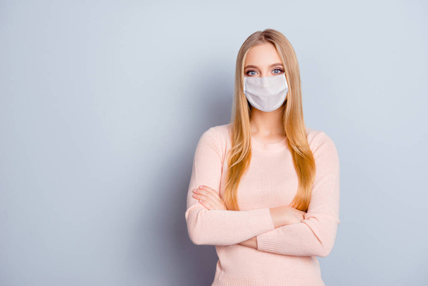 Portrait of charming healthy girl wearing safety mask folded arms copy space medicine isolated on gray color background - Foto, Bild