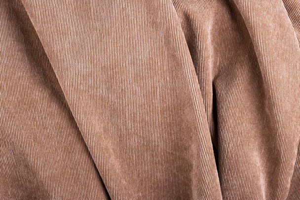 Texture of twisted cream corduroy textile for the background. Abstract corduroy background close up - Photo, Image