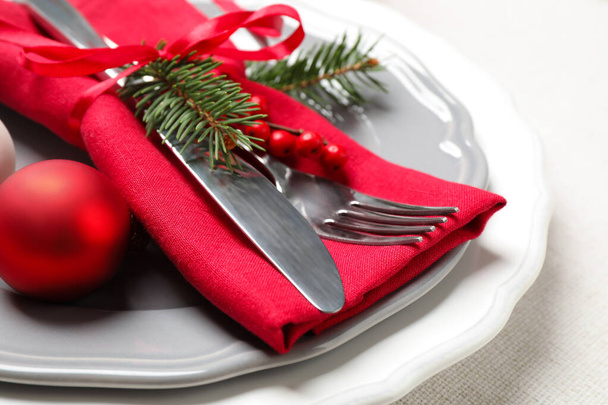 Festive table setting with beautiful dishware and Christmas decor on white background - Foto, imagen