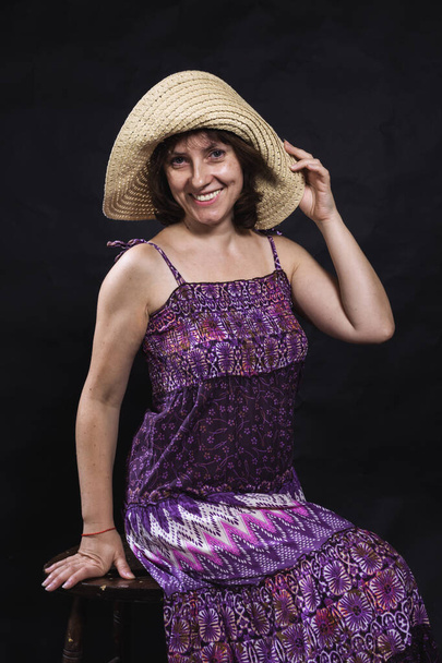 Cheerful 40 years old woman in the purple dress - Φωτογραφία, εικόνα
