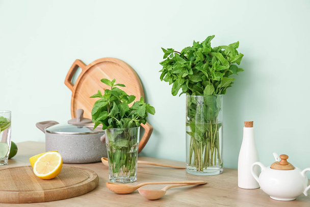 Fresh mint and citruses on kitchen table - Foto, immagini