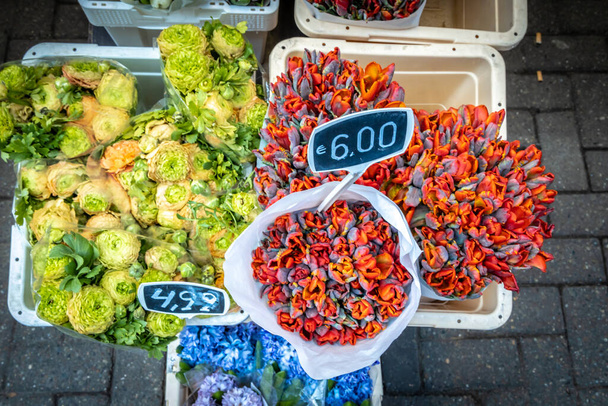 Flower market of Bloemenmarkt in Amsterdam, Netherlands - Photo, Image