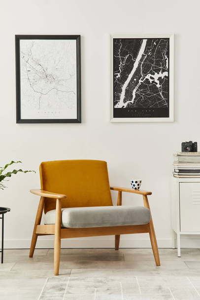 Retro and minimalist compositon of living room interior with design armchair, two mock up poster map, lamp, decoration, white wall and personal accessories. Template. Modern home decor. - Photo, Image