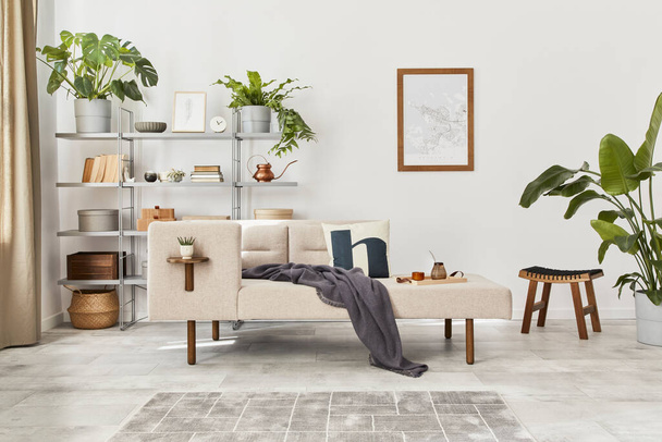 Scandinavian interior with stylish sofa, design furniture, bookcase, plants, decoration, mock up poster map and elegant personal accessories. Neutral living room in classic house. Template. - 写真・画像