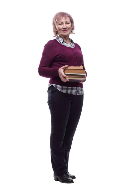 competent adult woman with a stack of books. isolated on a white - Φωτογραφία, εικόνα