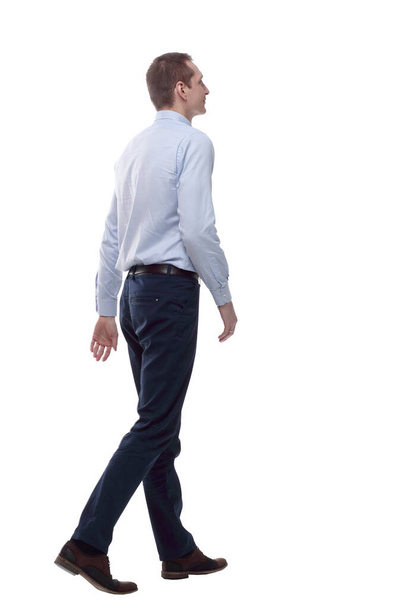 confident business man stepping forward . isolated on a white - Foto, Bild