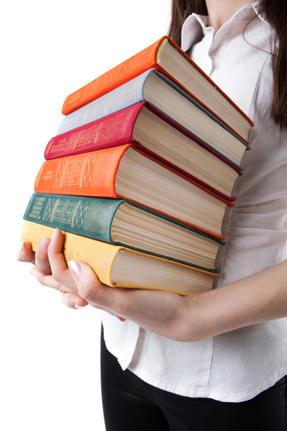 молодая девушка с стопкой книг
 - Фото, изображение