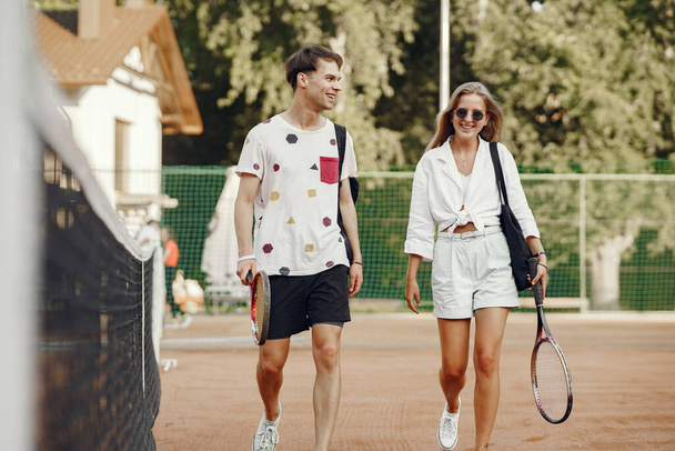  ouple play tennis game outdoor - Photo, Image