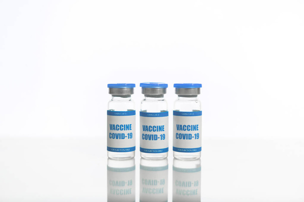 Vials of coronavirus vaccine isolated on white - Photo, image