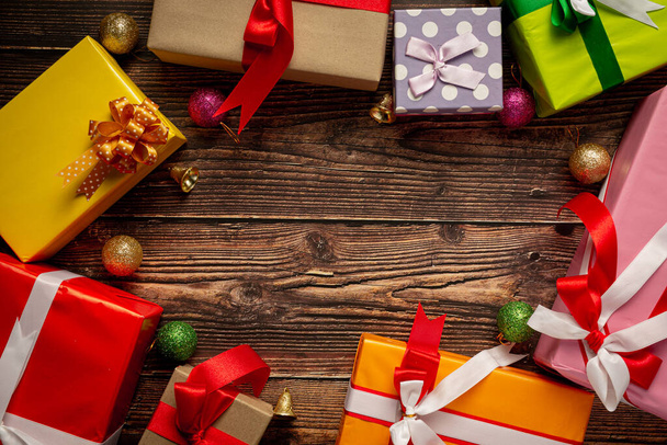 boxes of present with christmas ornament on wooden background - Foto, immagini