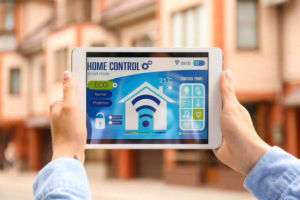 Woman using application of smart home automation - Photo, Image