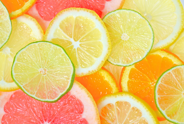 Sliced citrus fruits - Photo, Image