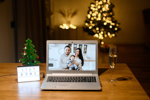 Videocall on the laptop in Christmas day - Foto, Imagen
