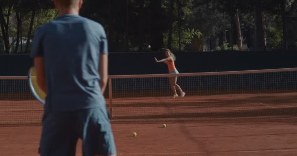 Nappal teniszező sportolók   - Felvétel, videó