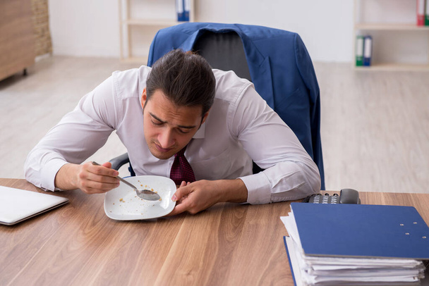 Young businessman working in the office - Photo, image