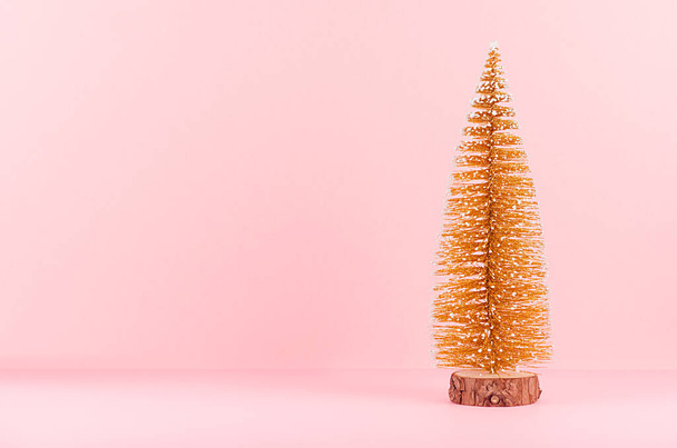 New Year background with golden sparkle christmas tree on soft light pink backdrop. - Φωτογραφία, εικόνα