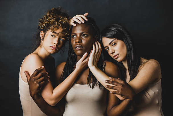 Multicultural group of beautiful women posing in underwear - 3 pretty girls portrait, concepts about multicultural people, inclusive society and body positivity - Foto, afbeelding