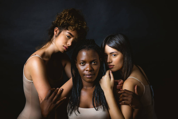 Multicultural group of beautiful women posing in underwear - 3 pretty girls portrait, concepts about multicultural people, inclusive society and body positivity - Photo, Image