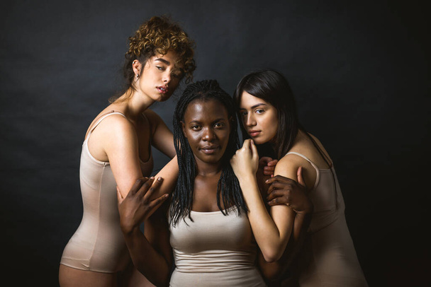 Multicultural group of beautiful women posing in underwear - 3 pretty girls portrait, concepts about multicultural people, inclusive society and body positivity - Φωτογραφία, εικόνα