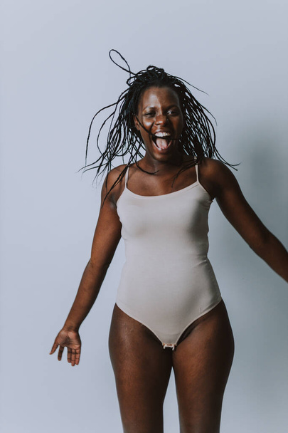 Beautiful woman posing in underwear - Pretty girl portrait, concepts about multicultural people, inclusive society and body positivity - Photo, image