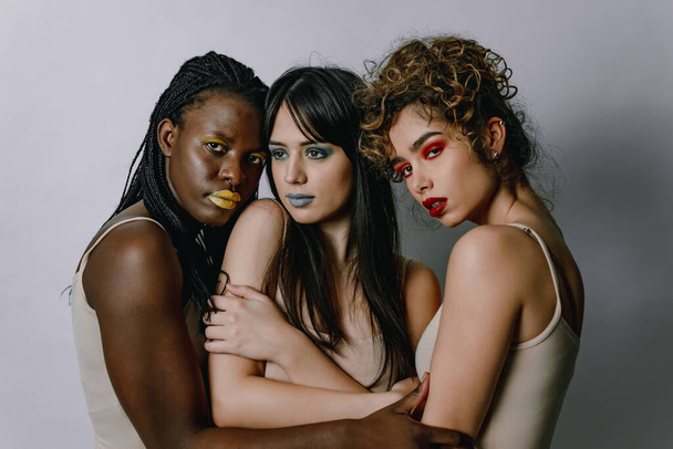 Multicultural group of beautiful women posing in underwear - 3 pretty girls portrait, concepts about multicultural people, inclusive society and body positivity - Fotoğraf, Görsel