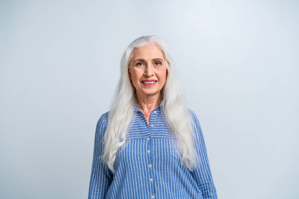 Beautiful senior woman portrait, studio shot on background  - Elderly person, half body shot - Foto, imagen