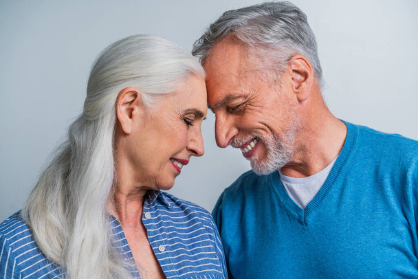Beautiful senior couple of lovers  - Elderly people portrait on white background - 写真・画像