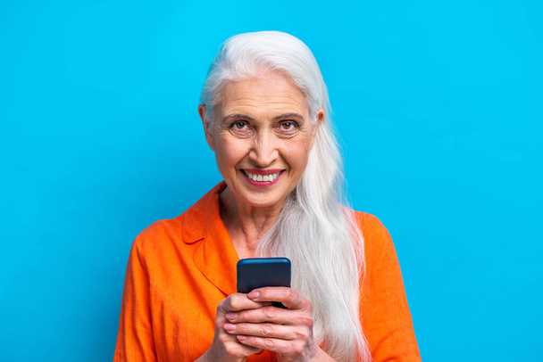 Beautiful senior woman portrait, studio shot on background  - Elderly person, half body shot - Photo, image