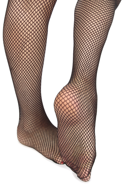 Woman feet with fishnet tights over white background - Zdjęcie, obraz