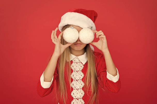 I spy. Happy child hold snowballs as glasses. Little girl enjoy Christmas eve party. New Year party. Santa party. Holiday party fun. Xmas decorations. Celebrate festive season - Foto, imagen