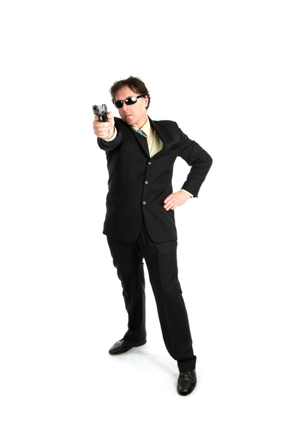 zakenman met pistool - Foto, afbeelding