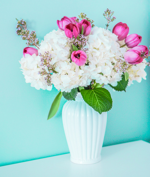 Spring bouquet on blue background - Fotó, kép