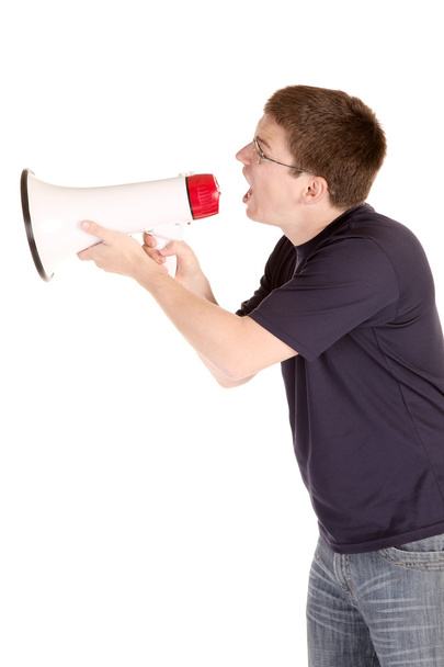 Young man screaming with megaphone - Φωτογραφία, εικόνα
