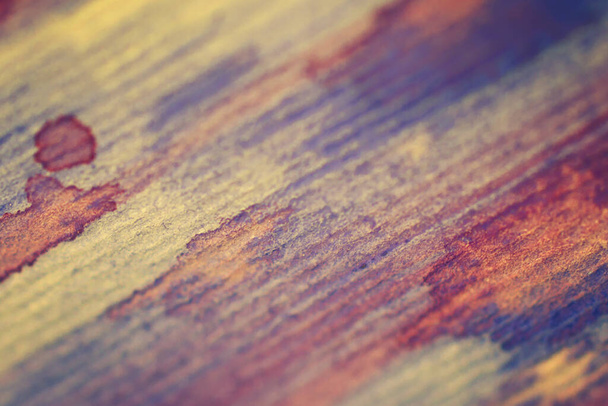 Watercolor background on textured paper purple and yellow stripes - Photo, Image