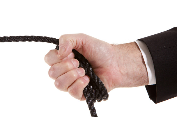 Бізнесмен тягне мотузку
 - Фото, зображення