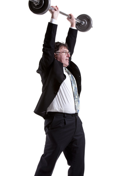 Businessman Lifting Barbell - Foto, afbeelding