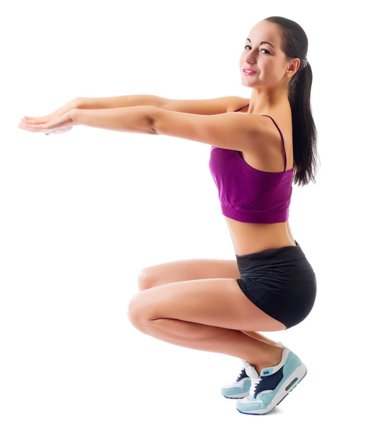 Young sporty woman doing gymnastic exercises - Zdjęcie, obraz