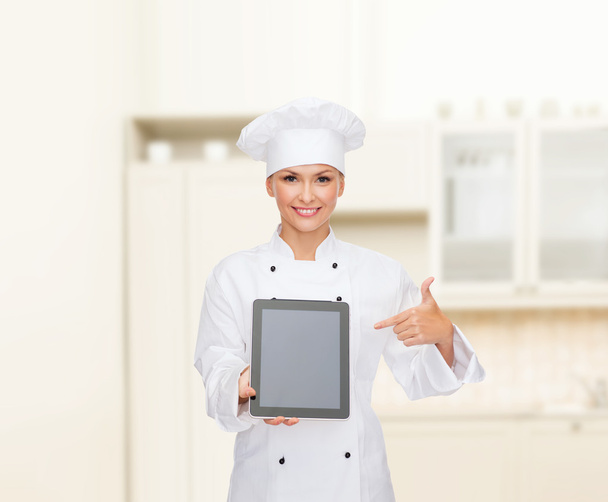 Smiling female chef with tablet pc blank screen - Zdjęcie, obraz