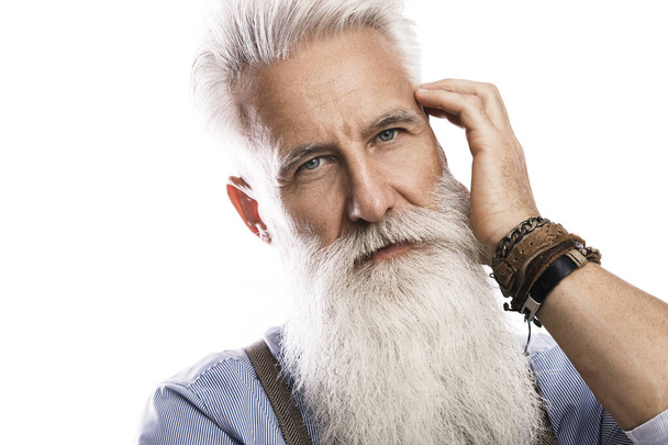 Stylish and handsome bearded senior man on white background  - Фото, изображение
