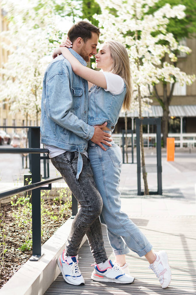 Portrait of young and sensual couple during a date outdoors - Photo, image