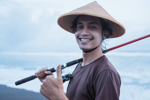 Portrait of a young fisherman - Photo, image