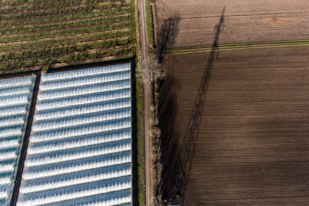 aerial view of the field and greenhouses in the countryside - Photo, Image
