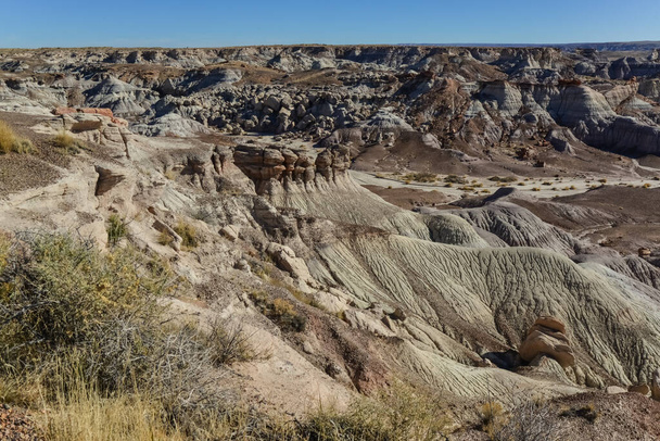 The Painted Desert on a sunny day. Diverse sedimentary rocks and clay washed out by water. Petrified Forest National Park, USA,  Arizona - Photo, image