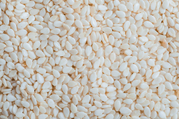 White shelled sesame close-up. - Foto, afbeelding